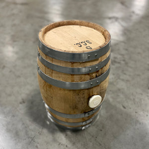 
                  
                    Head and side of a 5 Gallon Golden Moon Distillery Whiskey Barrel with a silicone size 9 bung in the bunghole
                  
                