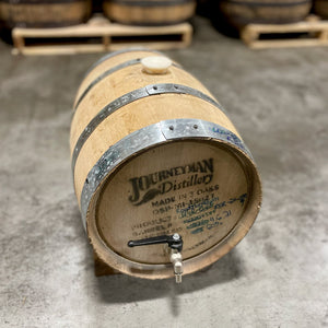 
                  
                    Head and side of a 5 Gallon Journeyman Rum Barrel (ex-whiskey) with a silicone bung and a spigot.
                  
                