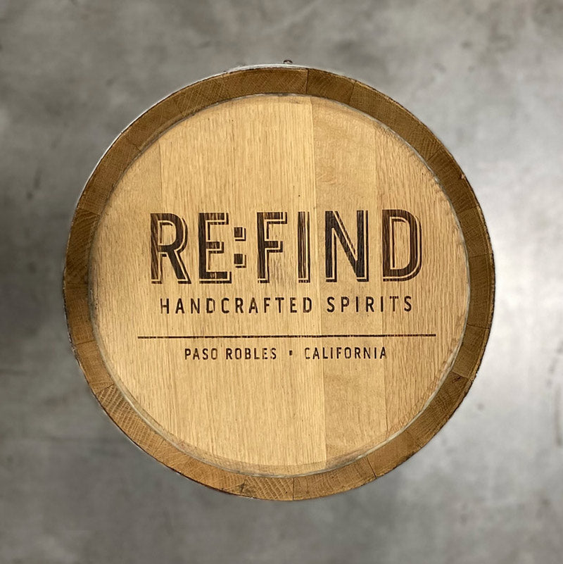 Head of a 15 Gallon Re:Find Distillery Barrel with Re:Find Handcrafted Spirits Paso Robles, California stamped on the head