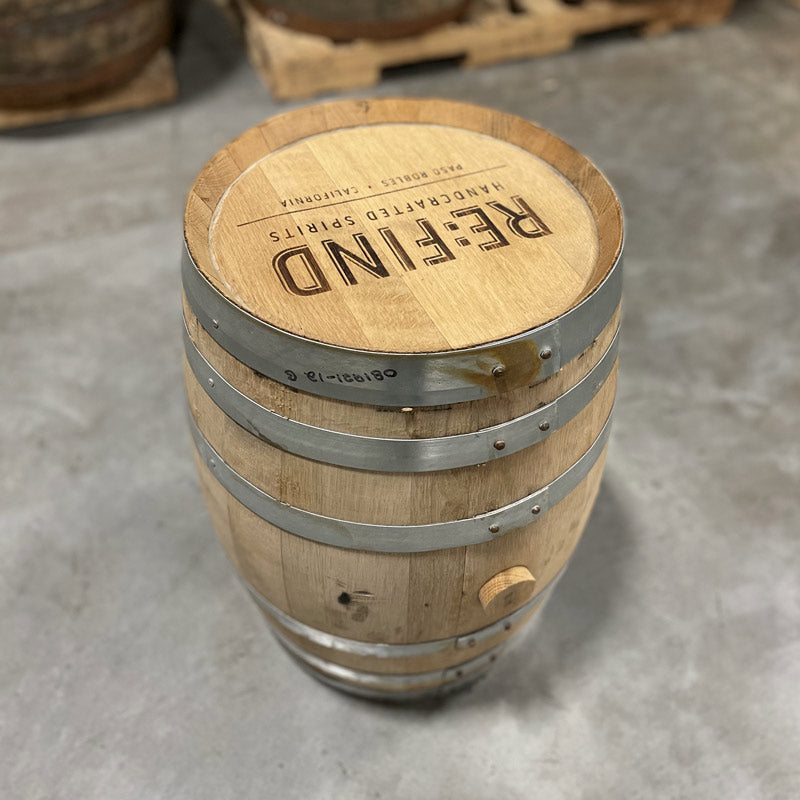 Head and side with bung of a 10 Gallon Re:Find Distillery Whiskey Barrel with Re:Find Distillery Handcrafted Spirits Paso Robles, California stamped on the head