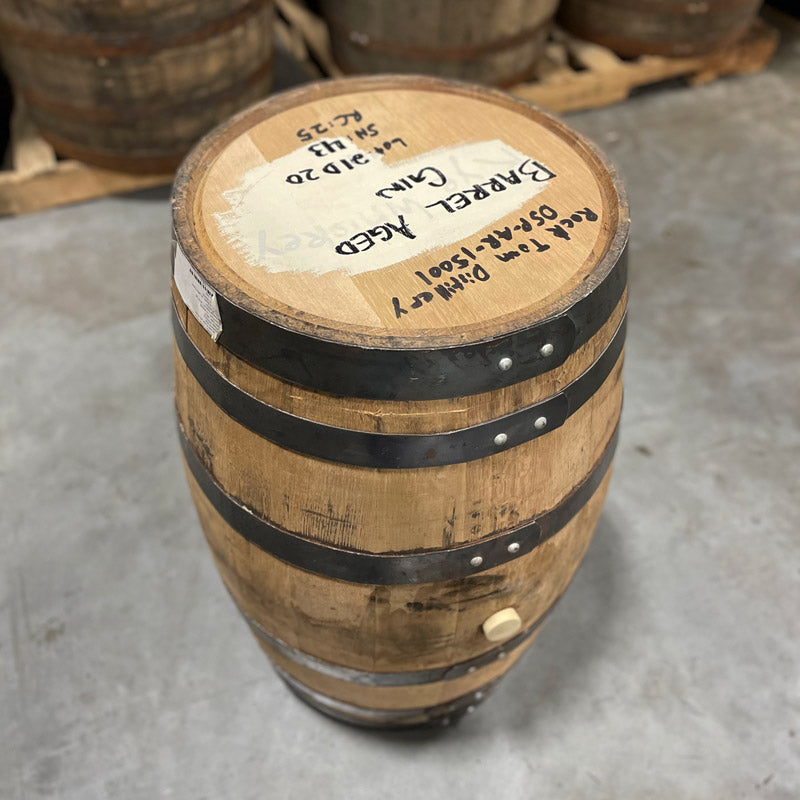 
                  
                    Head and side with bung of a 25 Gallon Rock Town Distillery Gin Barrel with handwritten distillery and barrel information on the head
                  
                