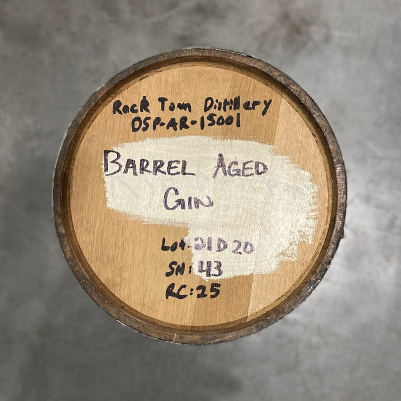 
                  
                    Head of a 25 Gallon Rock Town Distillery Gin Barrel with handwritten distillery and barrel information on the head
                  
                