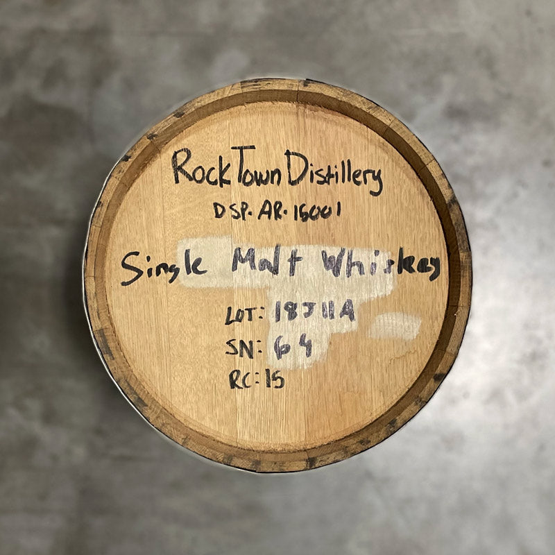 Head of a 15 Gallon Rock Town Distillery Single Malt Whiskey Barrel with handwritten distillery information and barrel notes