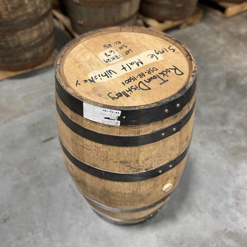 
                  
                    Head and side with bung of a 25 Gallon Rock Town Distillery Single Malt Whiskey Barrel with handwritten distillery information and barrel notes on the head
                  
                