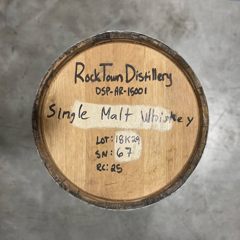 Head of a 25 Gallon Rock Town Distillery Single Malt Whiskey Barrel with handwritten distillery information and barrel notes