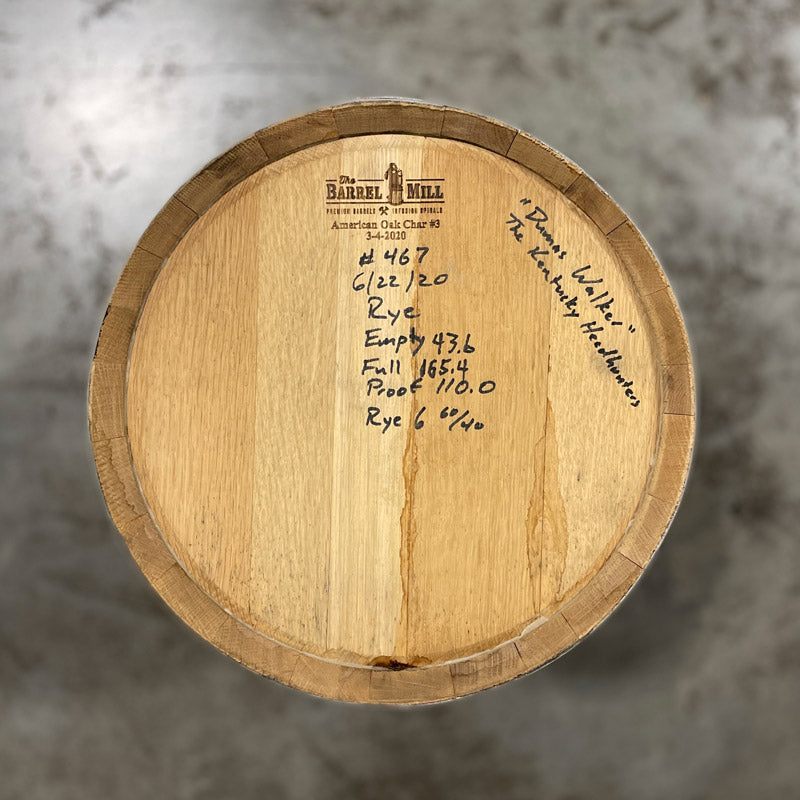 
                  
                    Head of a 15 Gallon Lonely Oak Rye Whiskey Barrel with handwritten notes on the head, including fill date and spirit info.
                  
                