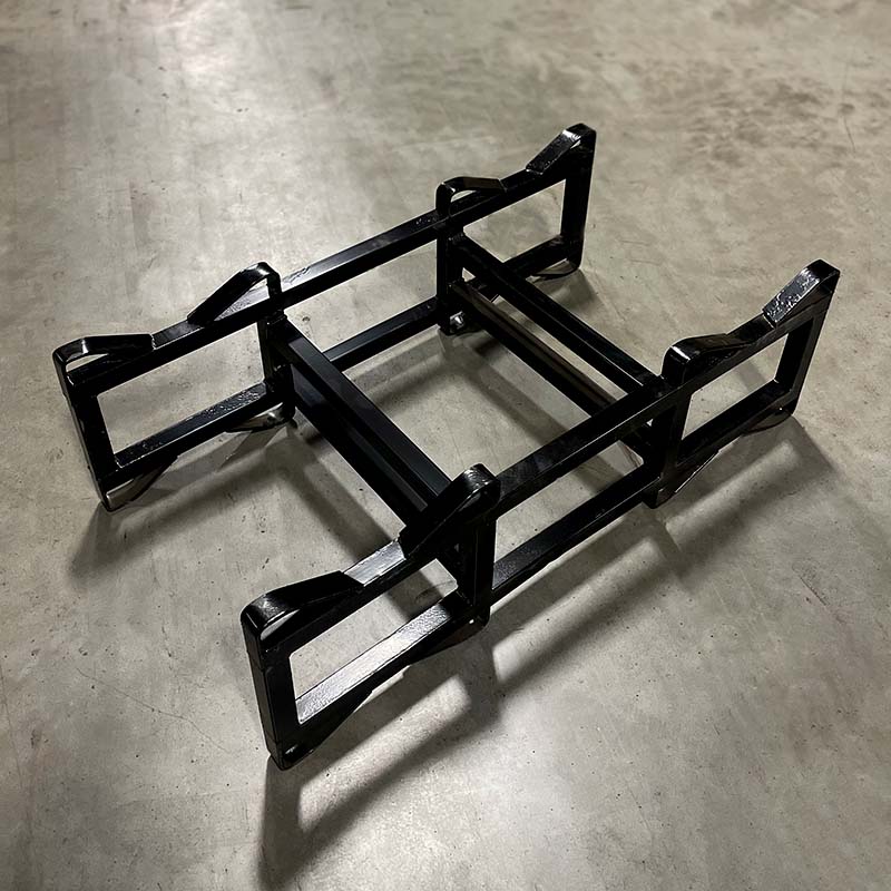 View from above of a black refurbished 25-30 gallon double barrel steel rack