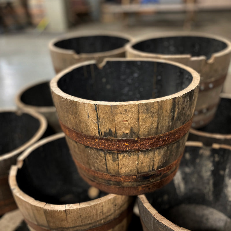 
                  
                    15 gallon small half whiskey barrels planters stacked on a pallet
                  
                