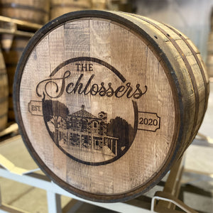 
                  
                    Custom design laser engraved whiskey barrel with The Schlossers name, Est. 2020 and house image
                  
                