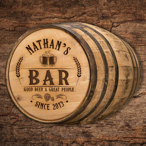 
                  
                    Full size whiskey barrel with engraving on the head that says Nathan's Bar Good Beer & Great People Since 2013 with barley, hops and clinking beer glass design
                  
                