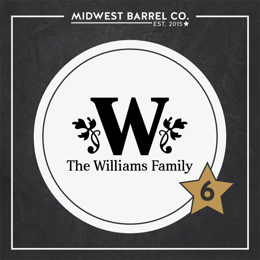 
                  
                    Option No. 6 with W in the center and floral design on each side and The Williams Family underneath the initial
                  
                