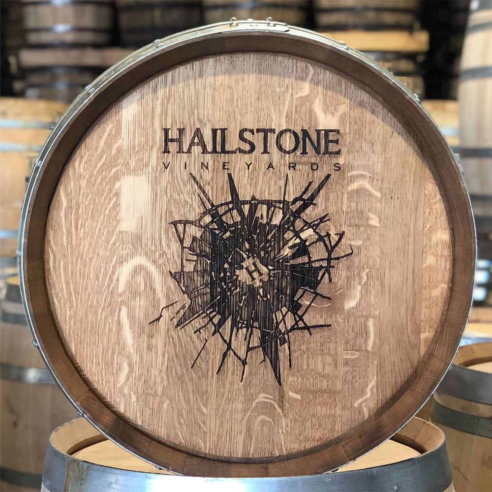 
                  
                    Laser engraved wine barrel logo design for Hailstone Vineyards with a hail impact logo
                  
                