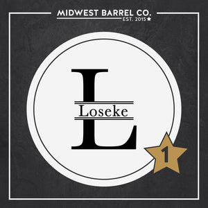 
                  
                    Engraving design option 1 with L initial and Loseke family name in the center
                  
                