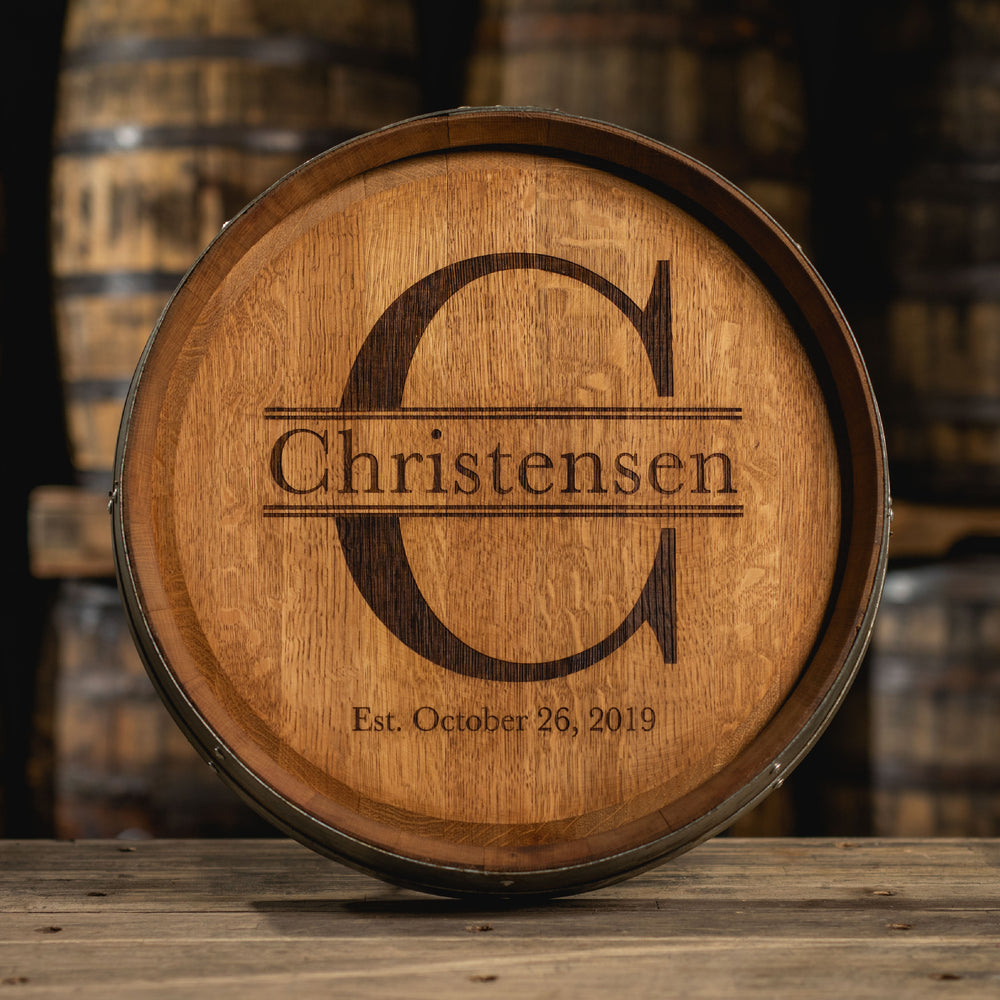 Engraved barrel head with large C initial and Christensen family name in the center and Est. October 26, 2019 anniversary date at the bottom