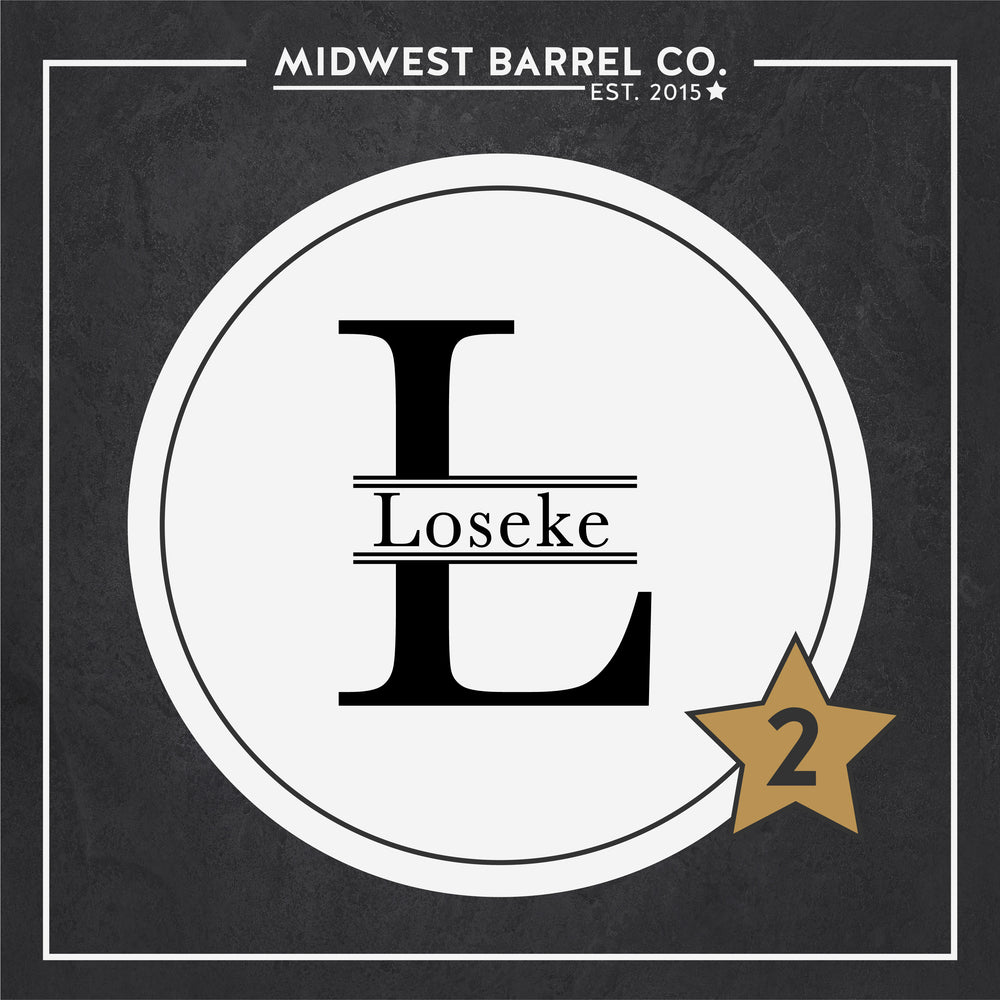 
                  
                    Engraving design option 2 with L initial and Loseke family name in the center
                  
                