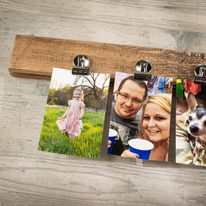 
                  
                    Alternative use of a whiskey barrel stave block with magnetic clips holding pictures
                  
                