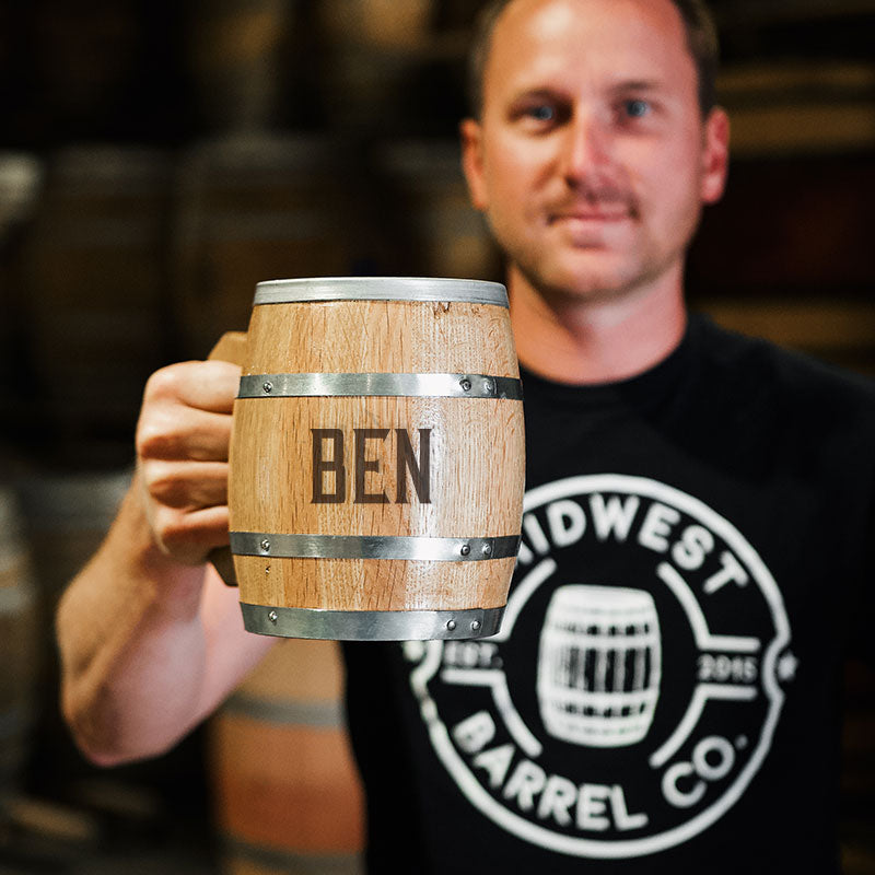 Barrel Ben holding Personalized Barrel Mug with Last Name