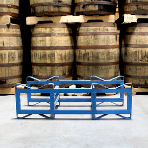 
                  
                    Used 2-Barrel 25/30 Gallon Steel Rack on floor in front of whiskey barrels on pallets
                  
                