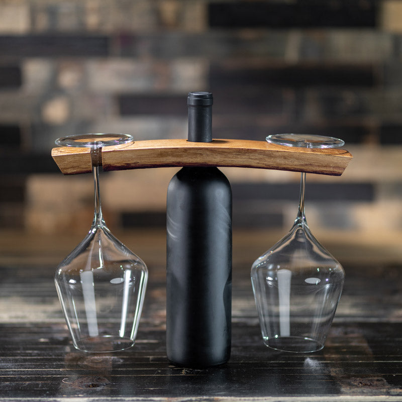 Wine Bottle and Glass Holder holding bottle in center and two glasses upside down