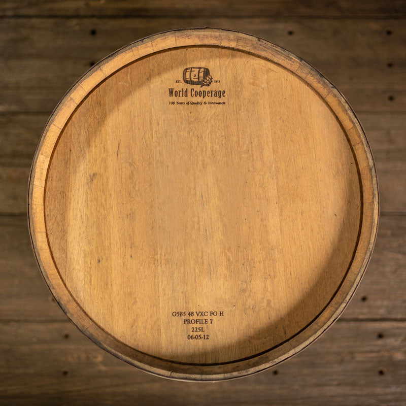 View of head of a neutral white chardonnay wine barrel with cooperage markings